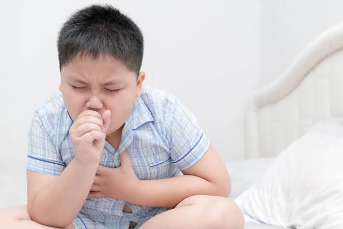 niño con tos